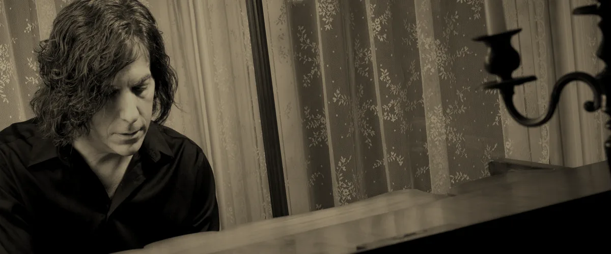 Perry Montauredes at the piano